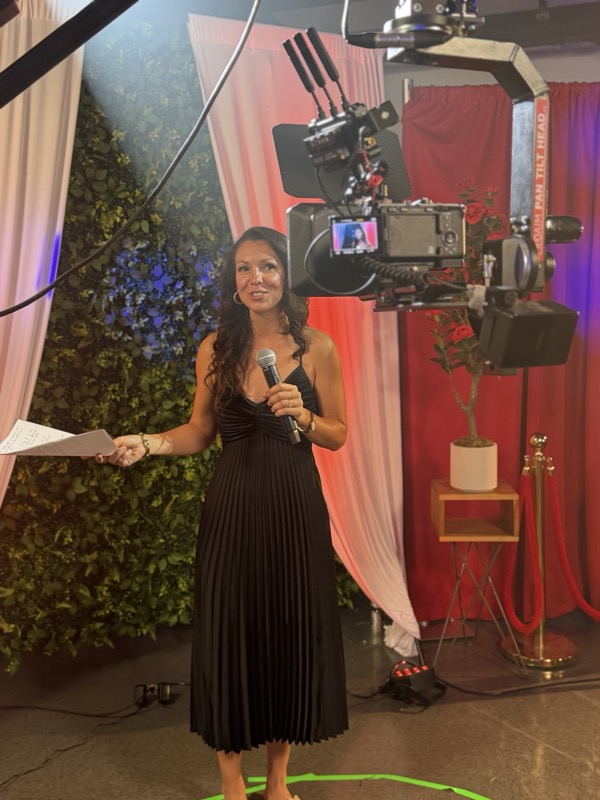 Nicole on camera for a promo shoot